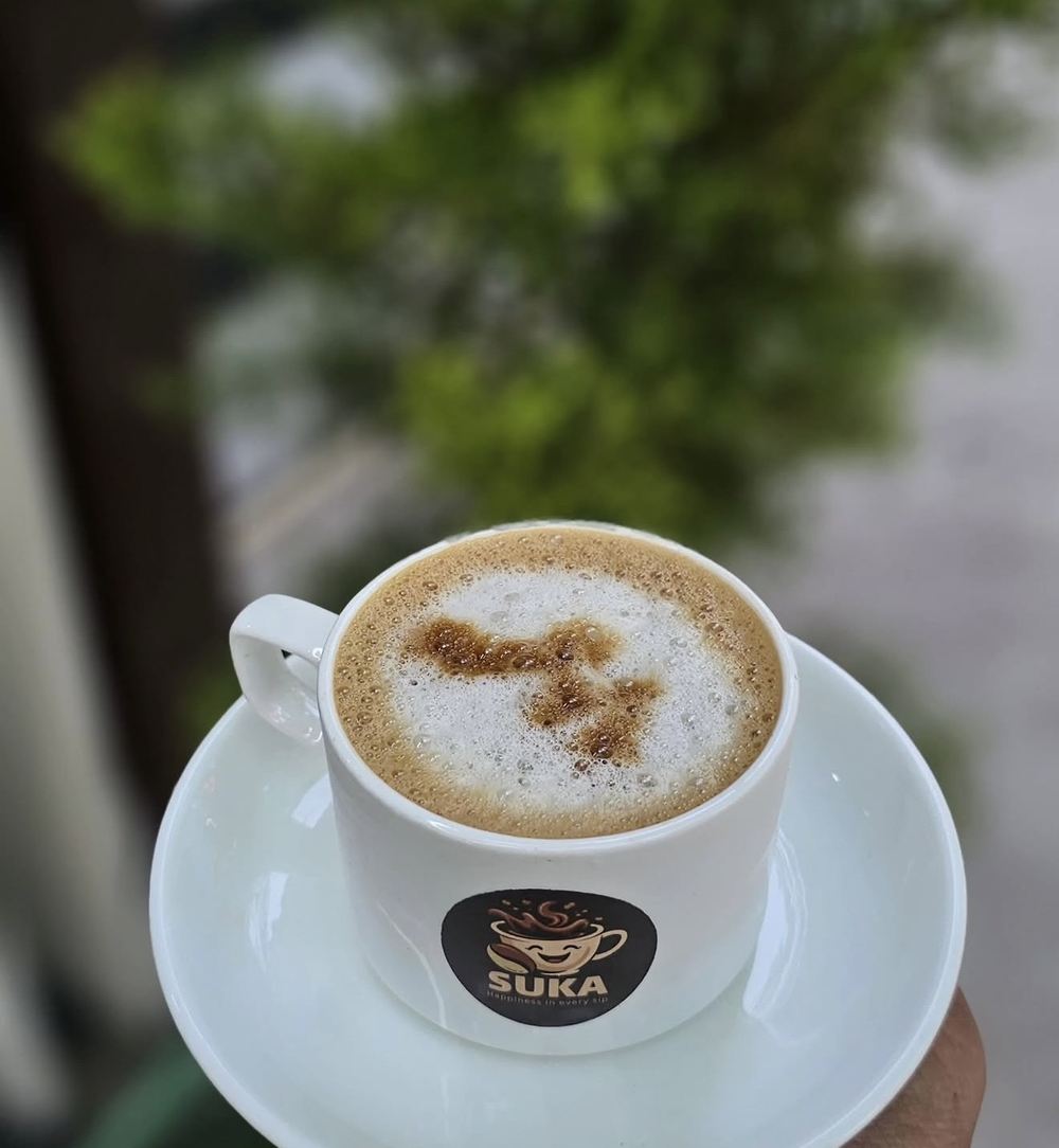 Coffee served in a SUKA branded cup